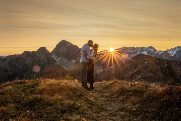 sunset engagement session in the mountains in the alps