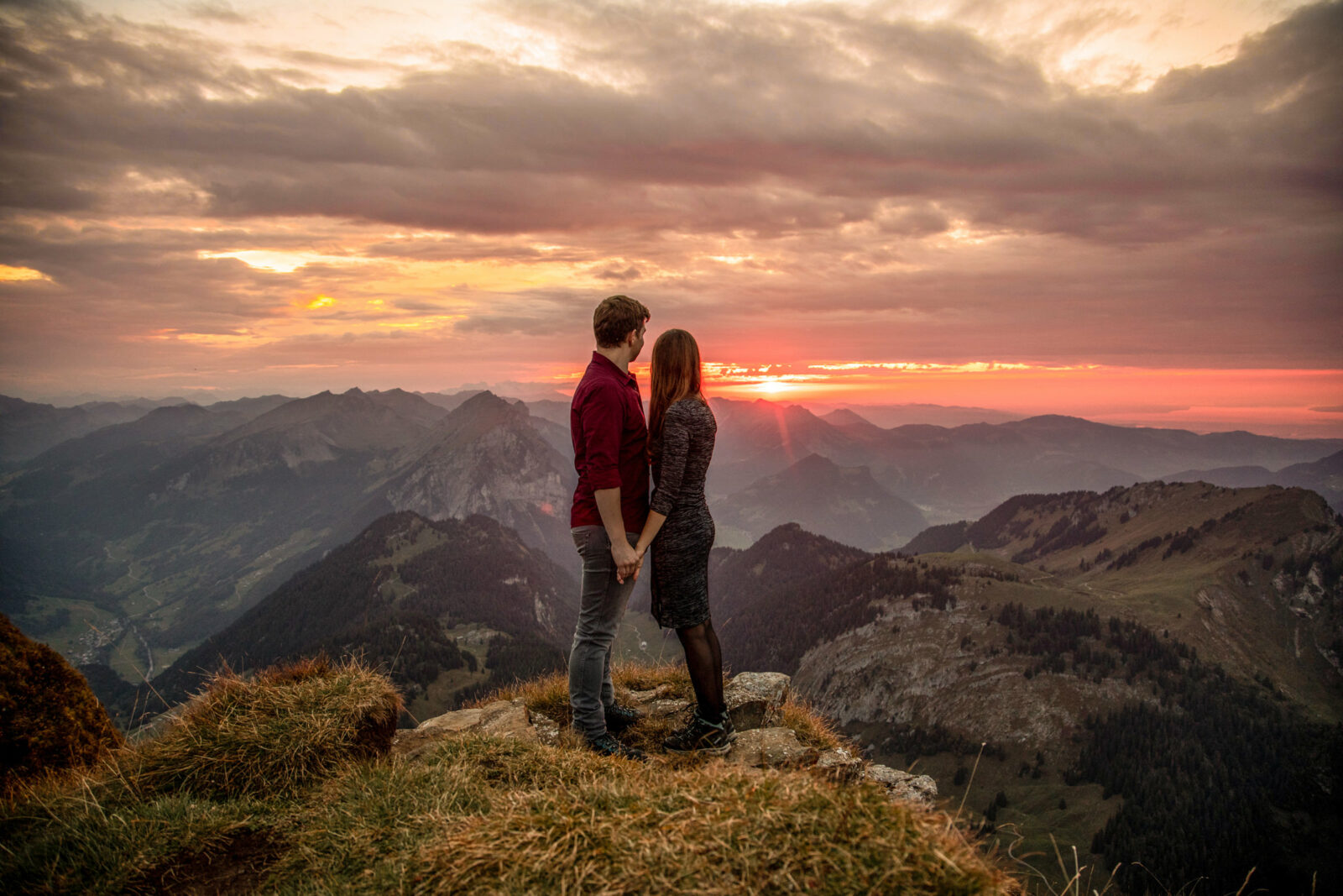 sunset engagement photos on a mountain in austria europe