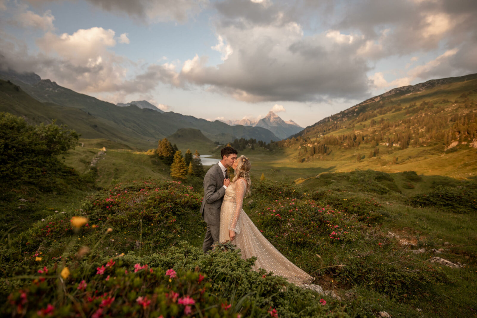 Elopement in Austria in the wildflowers on a mountain