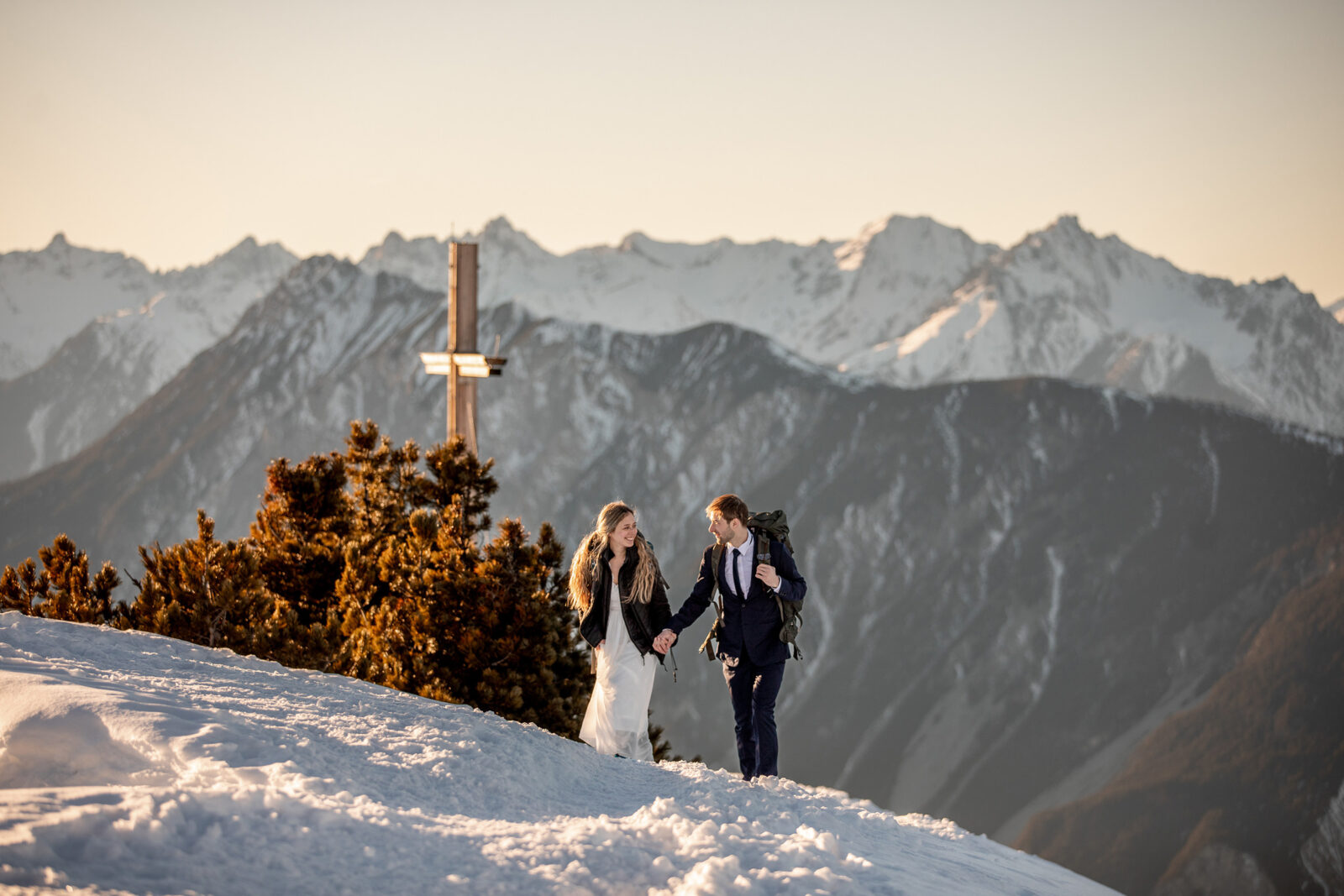 winter elopement in Tyrol, Austria on a mountain during sunset