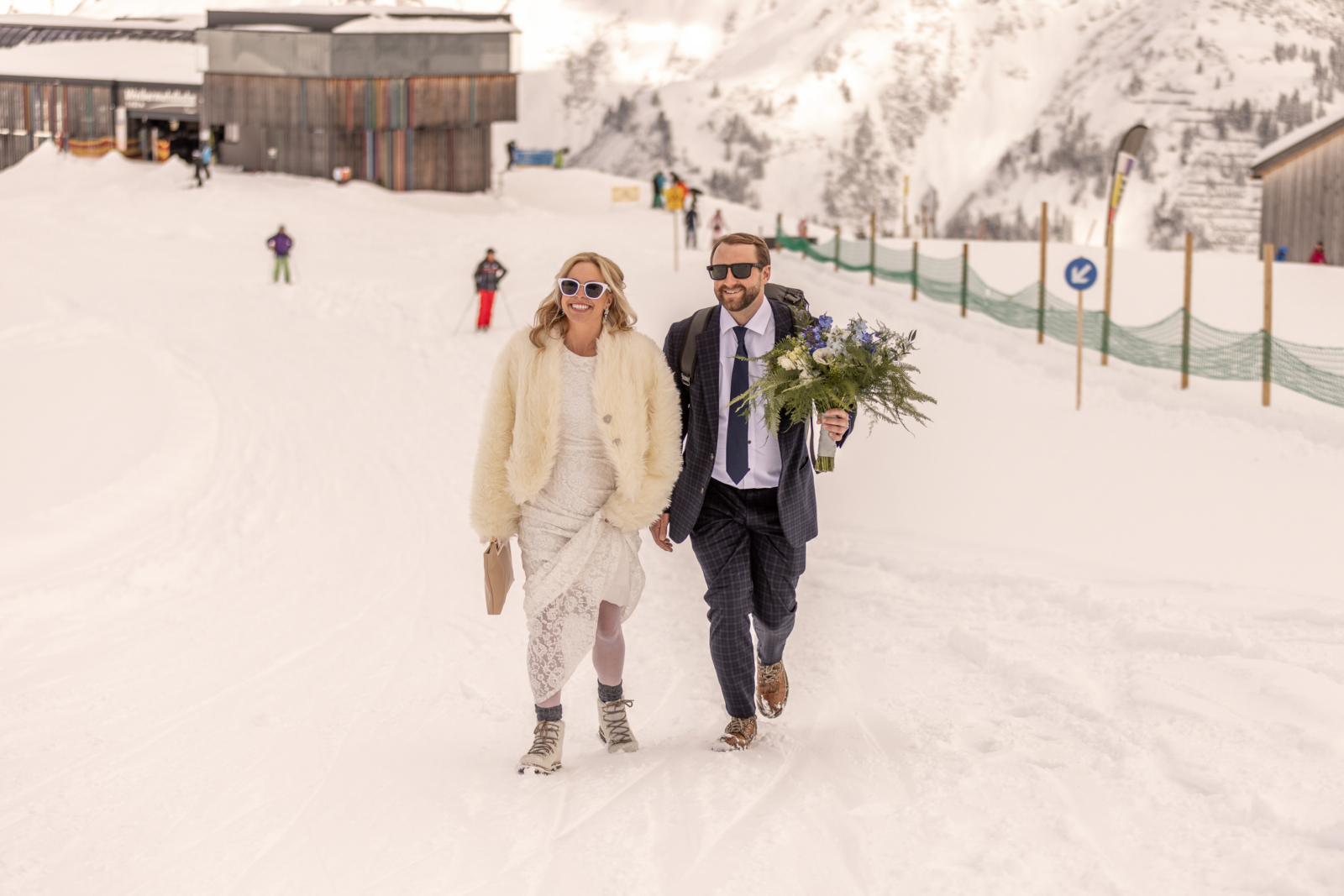 on the way to the wedding ceremony in the snowy mountains