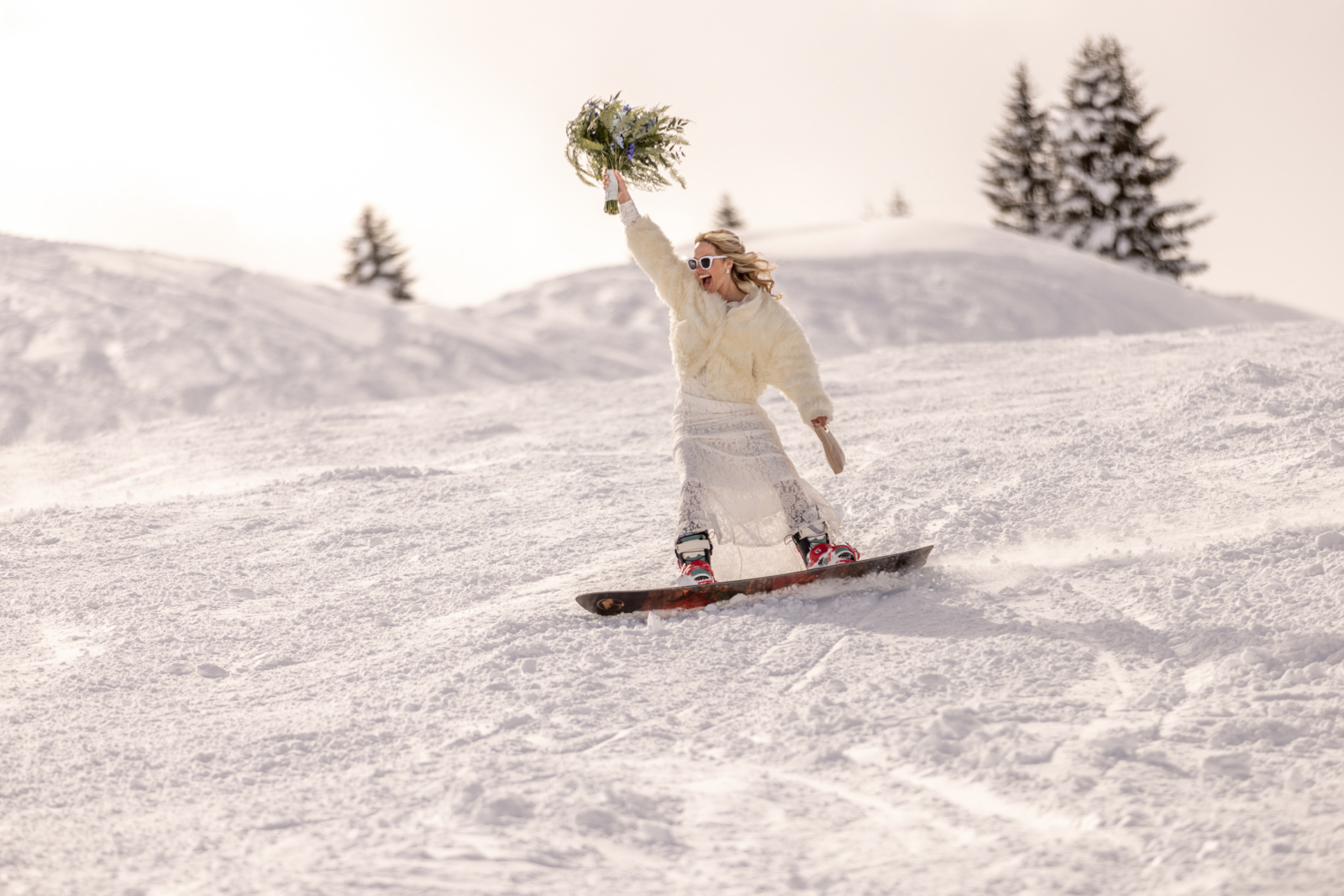 snowboard bride having fun on the slopes