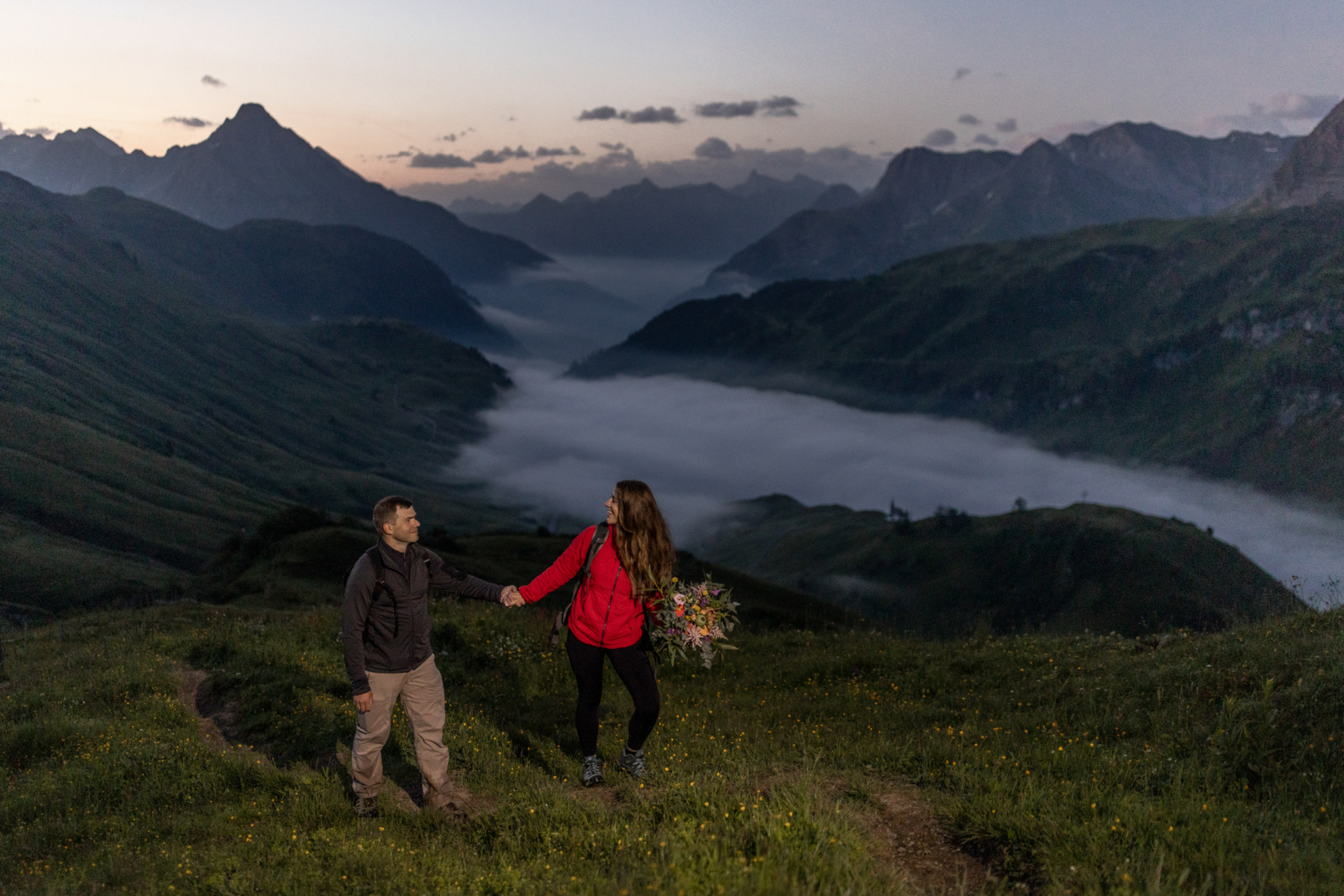 Hike in the dark to the elopement location in the Alps