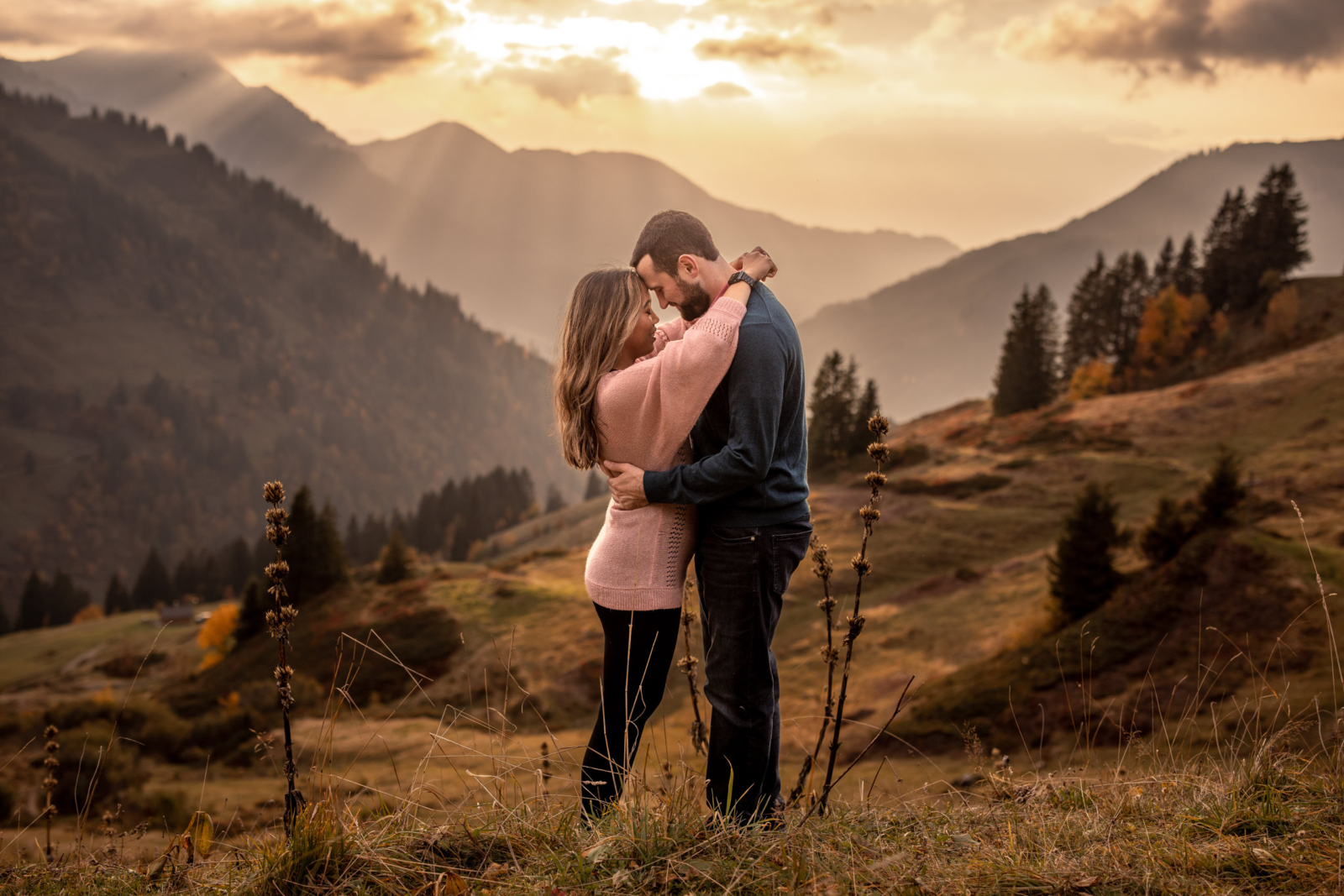 romantic couple photos during golden hour in the mountains