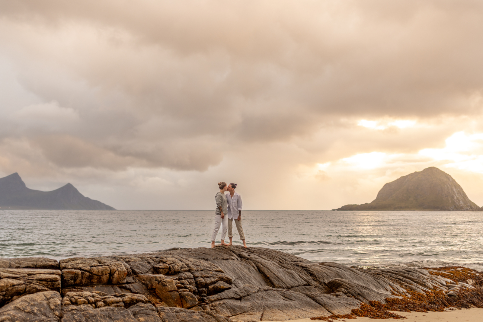 sunset engagement photos at the beach on the Lofoten Islands in Norway