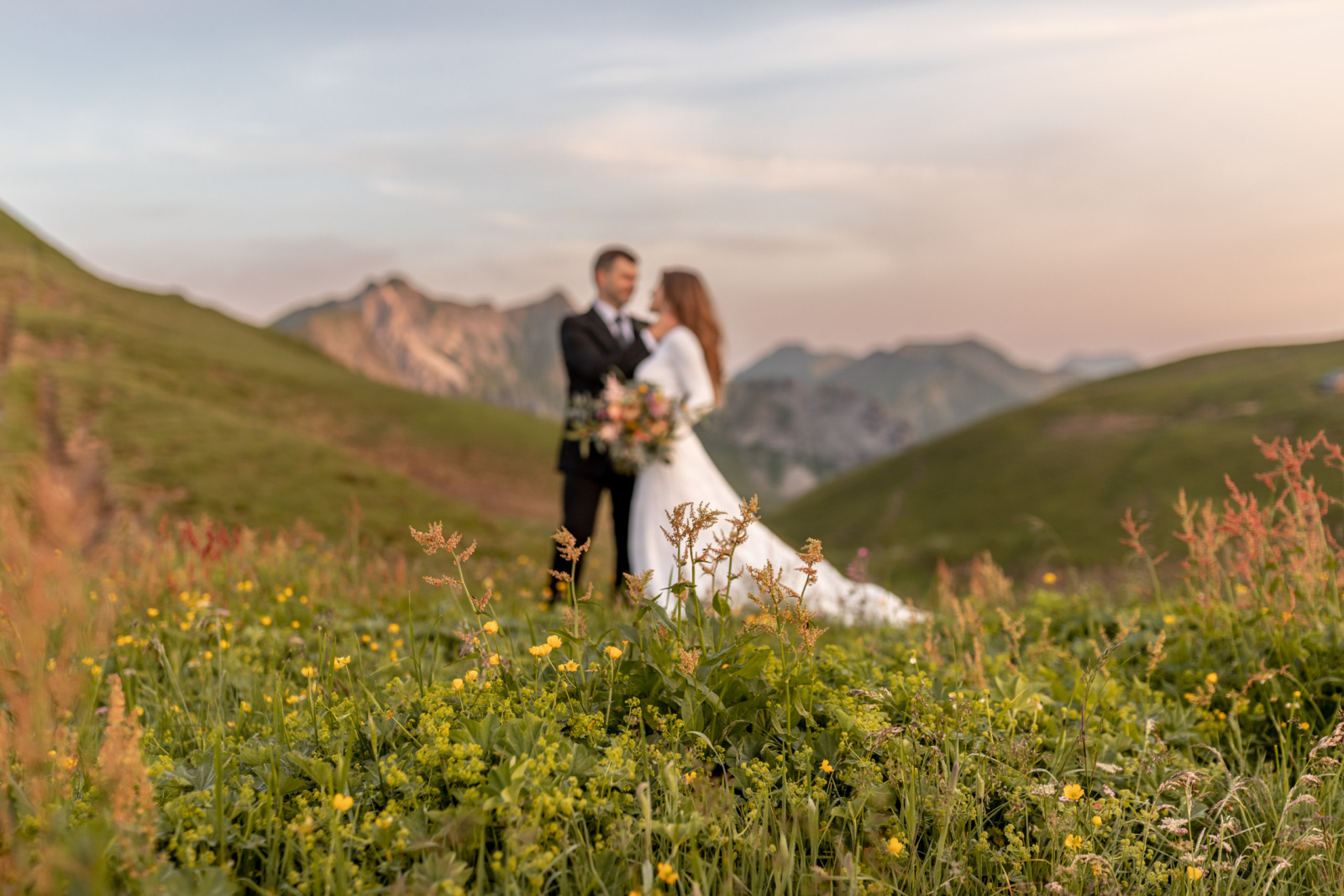 A Sunrise Wedding Amidst the Blooming Wildflowers in the Alps