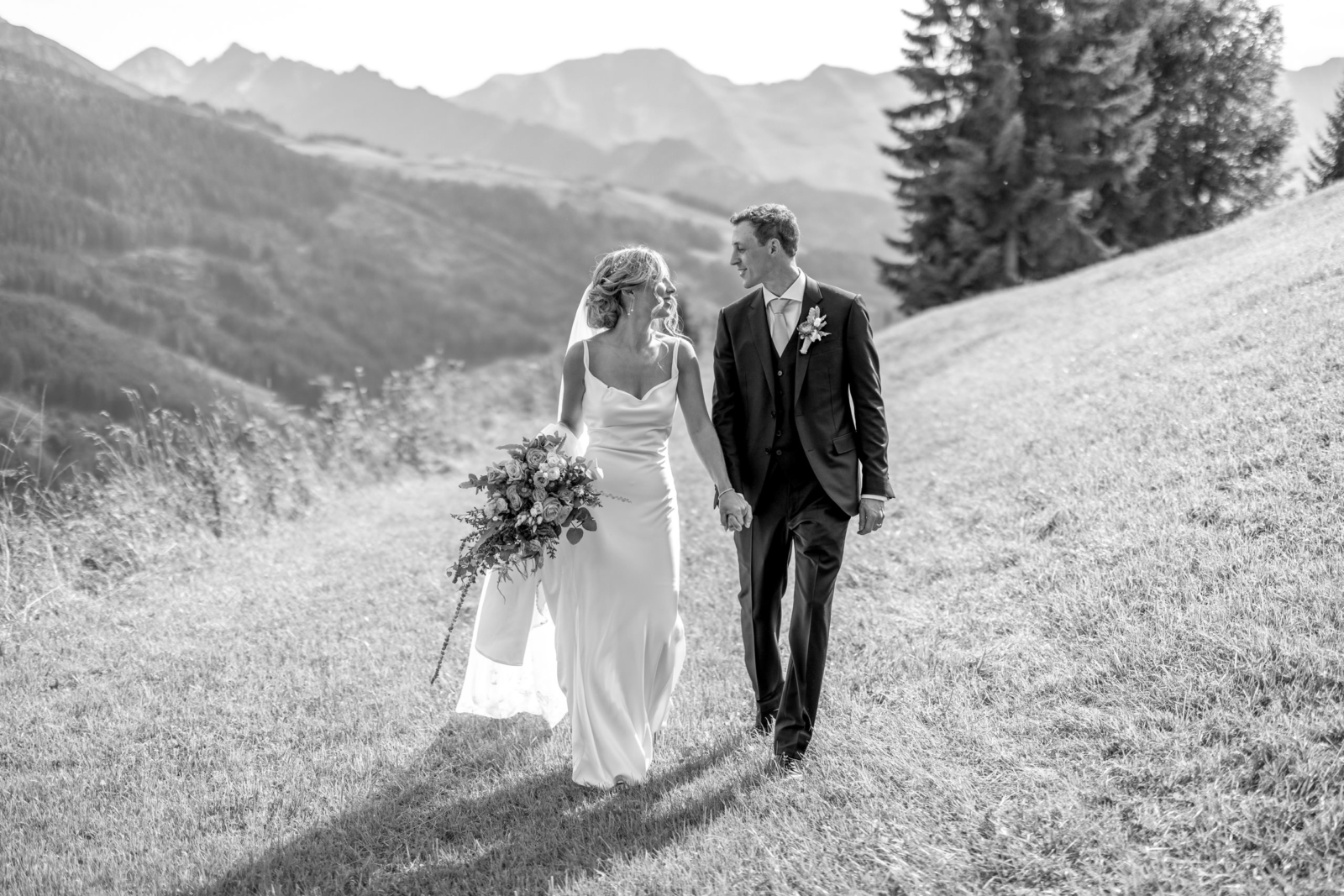 black and white wedding photo in the mountains