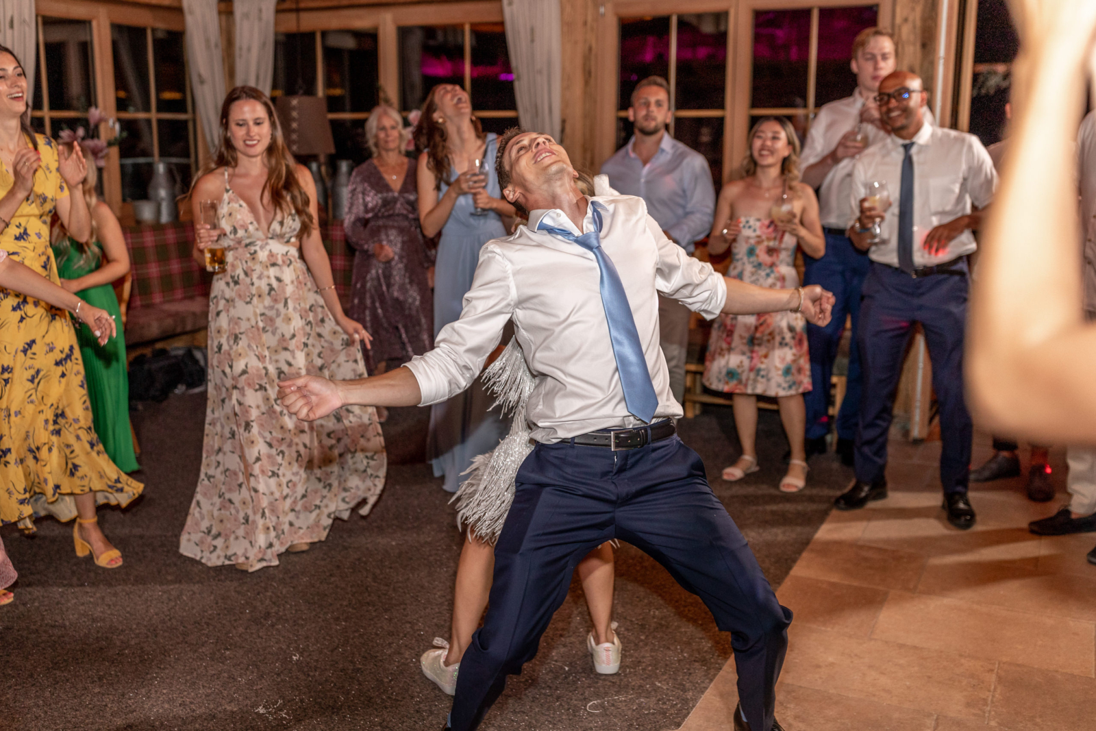 bridal couple is having the best time on the dancfloor