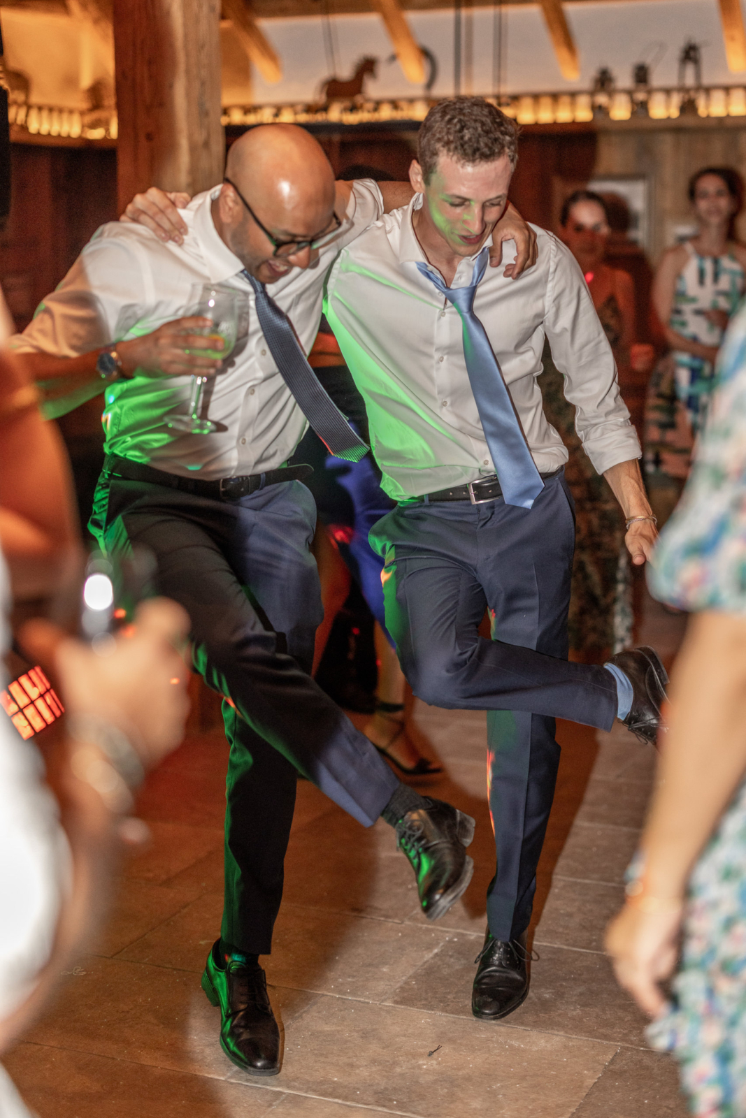 groom and his best man are dancing