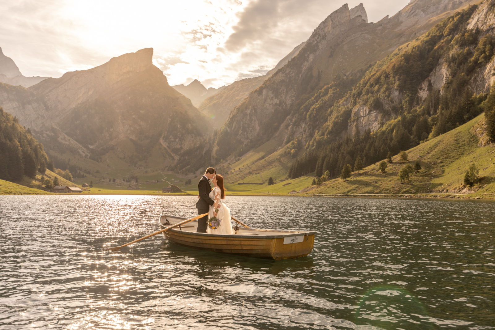 Mountain lake with boat elopement packages switzerland