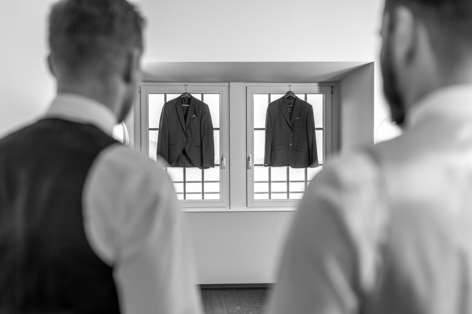 black and white wedding photography - groom getting ready