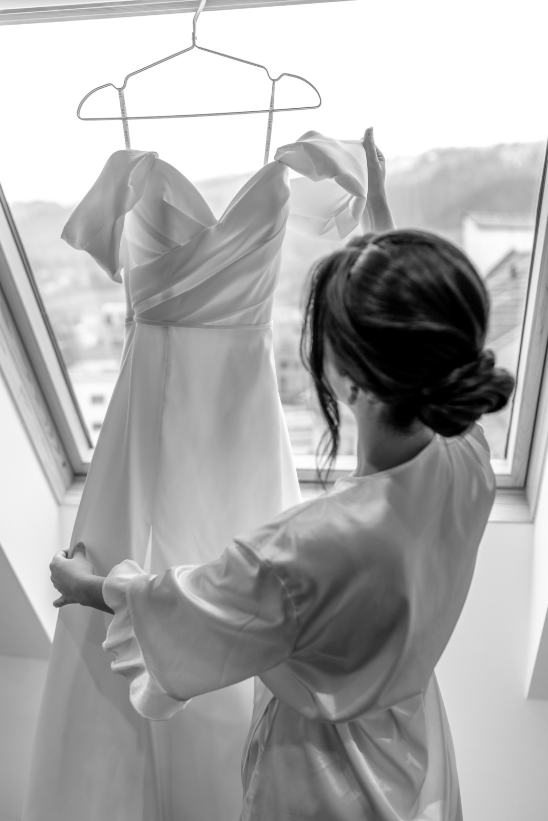 beautiful wedding dress - getting ready black and white photo