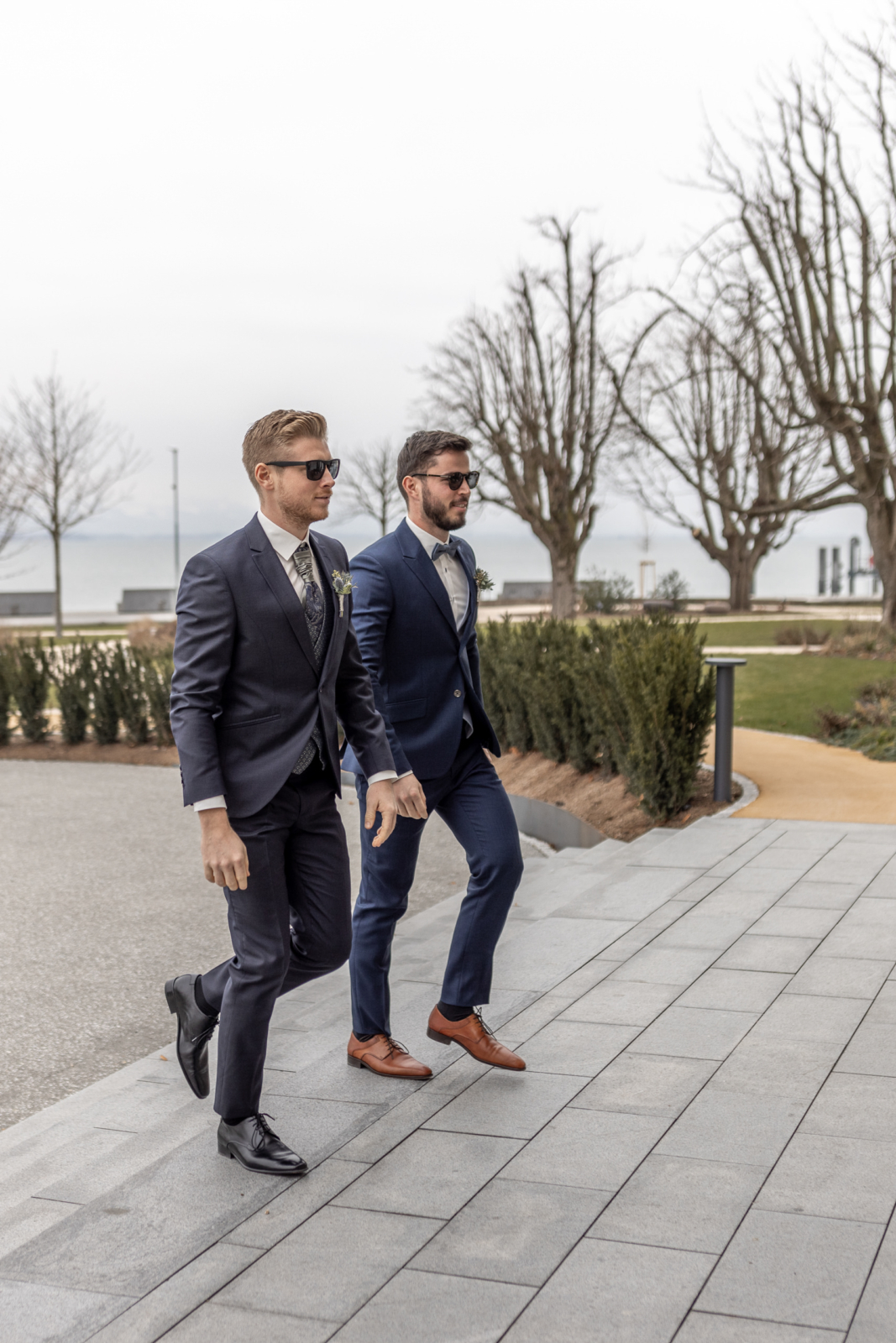 groom and best man arrive at the wedding location in Austria
