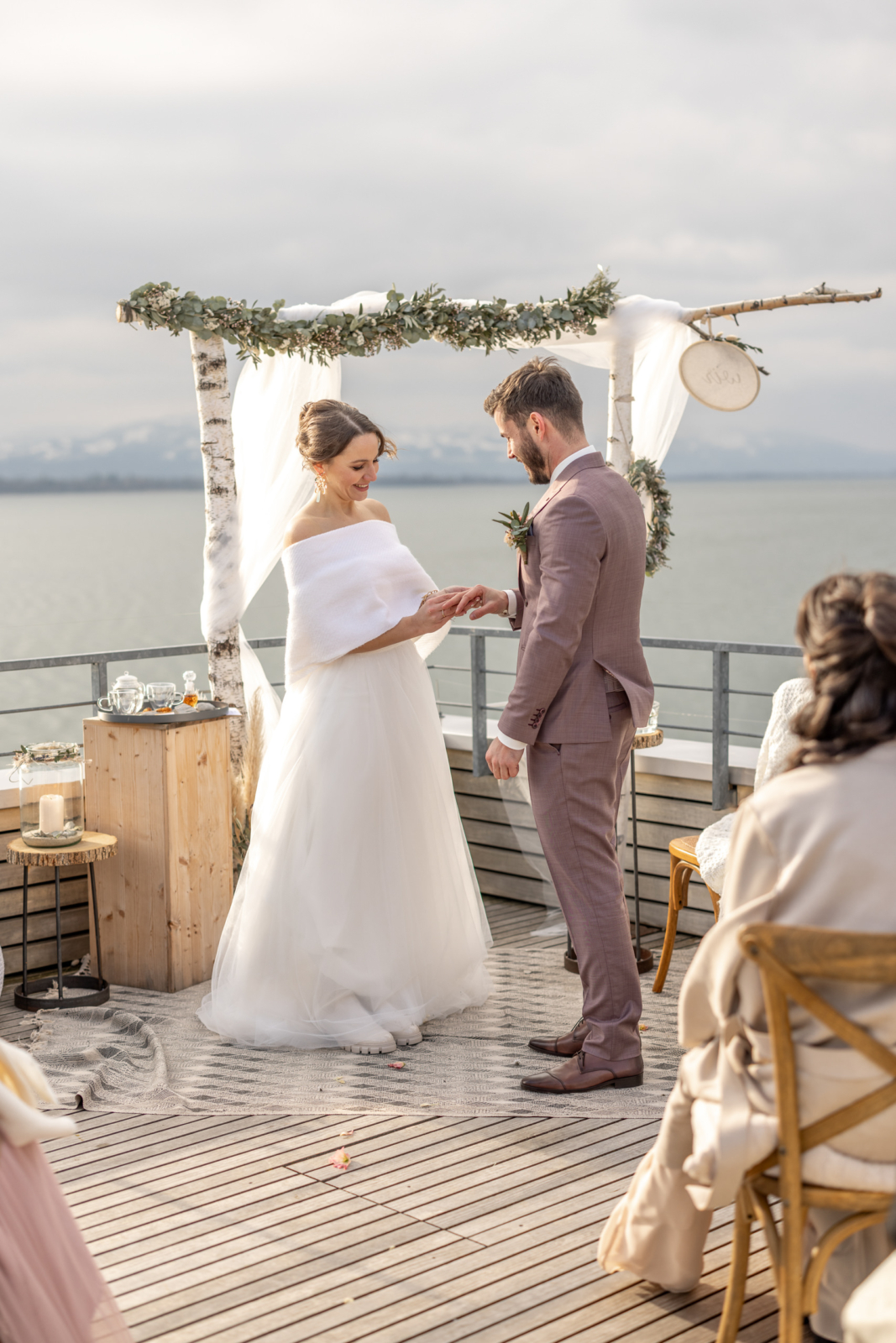 ring exchange at the wedding ceremony by the lake of constance