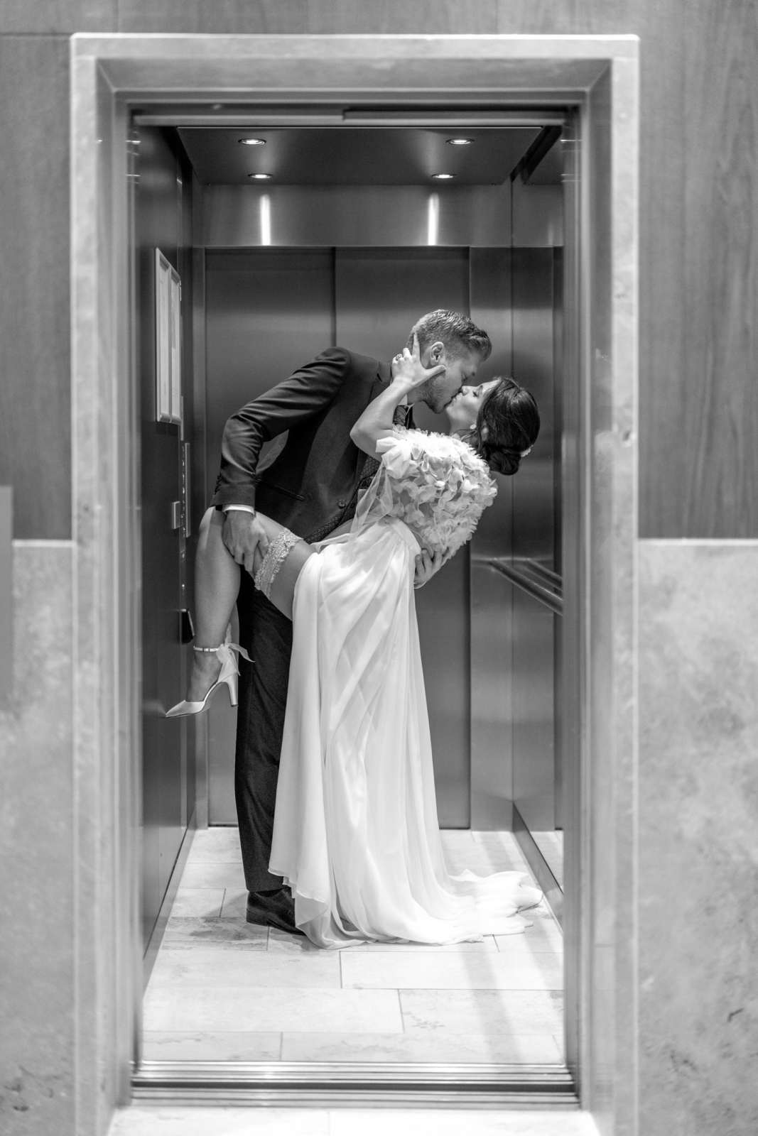 wedding couple photos in the elevator
